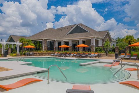 Sparkling swimming pool and spacious sundeck at The Oxmoor in Birmingham, AL